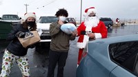 Fernando with Santa and Elf 